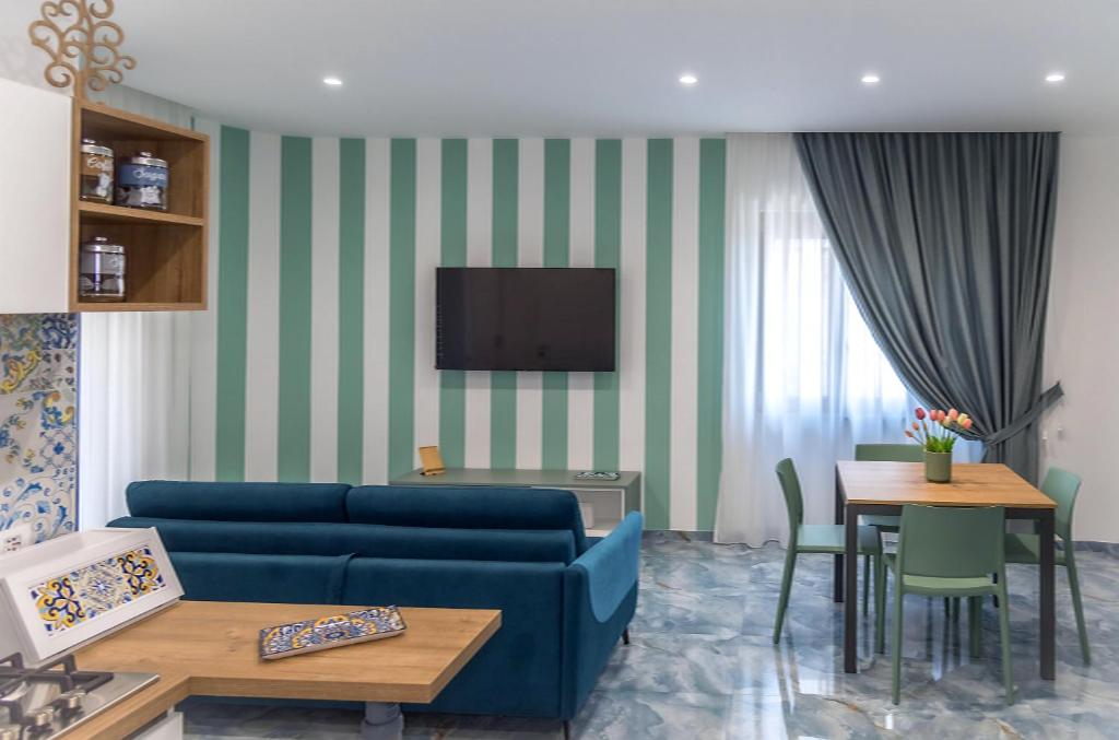 TV a/nebo společenská místnost v ubytování Maison Matie B&B Ercolano