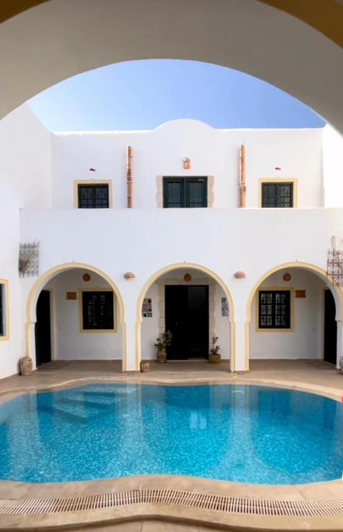 Bazén v ubytování Résidence Ulysse Djerba nebo v jeho okolí