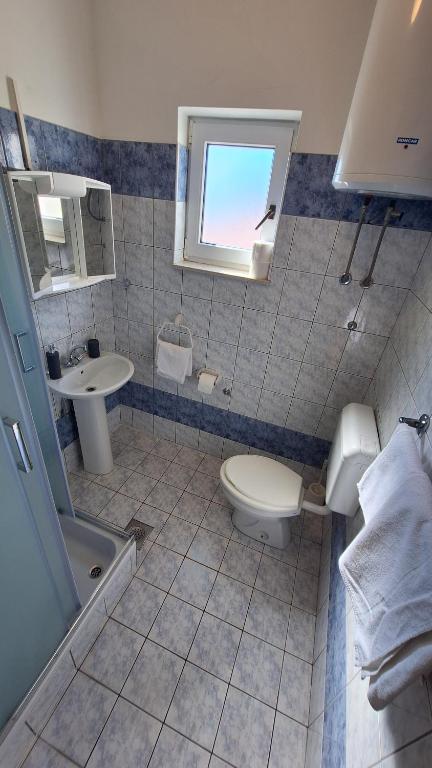 Koupelna v ubytování Anic Apartments Stanići