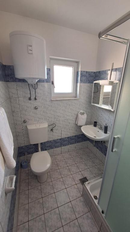 Koupelna v ubytování Anic Apartments Stanići