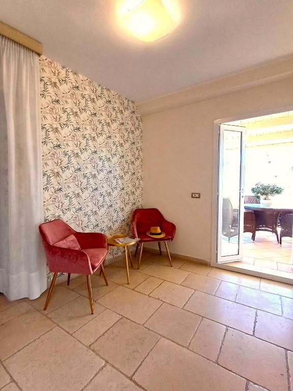 Posezení v ubytování Hotel L'Arcangelo - Boutique Hotel