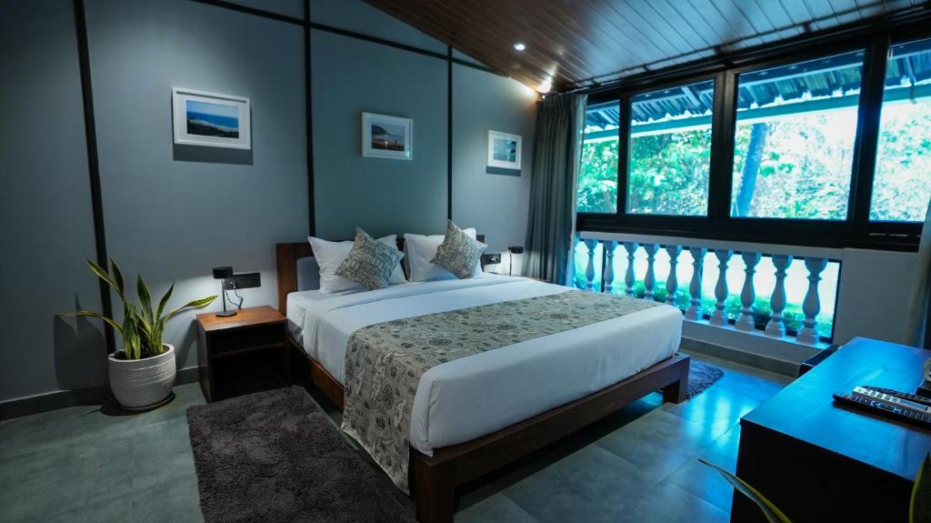 Postel nebo postele na pokoji v ubytování Sort By Stays, Grand Peddem, Anjuna