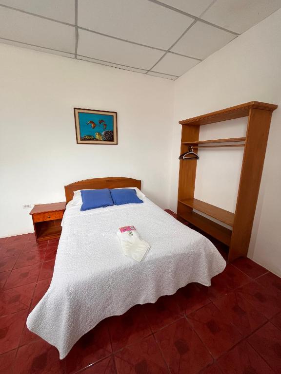 Postel nebo postele na pokoji v ubytování Las Gardenias Hostel - Starlink Internet
