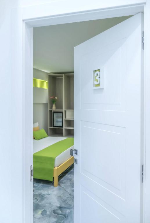 Postel nebo postele na pokoji v ubytování Maison Matie B&B Ercolano