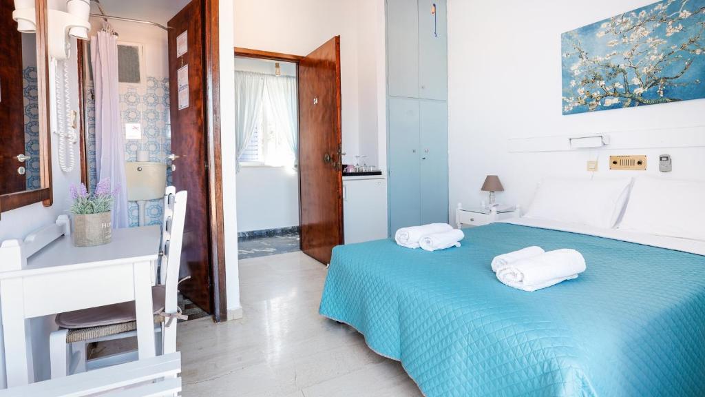 Postel nebo postele na pokoji v ubytování Melissani hotel