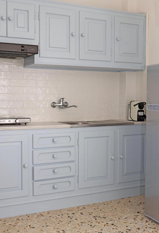 Kuchyň nebo kuchyňský kout v ubytování Aira Apartments