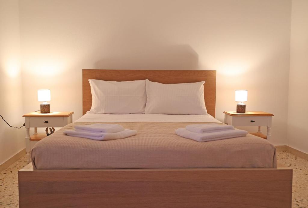 Postel nebo postele na pokoji v ubytování Aira Apartments