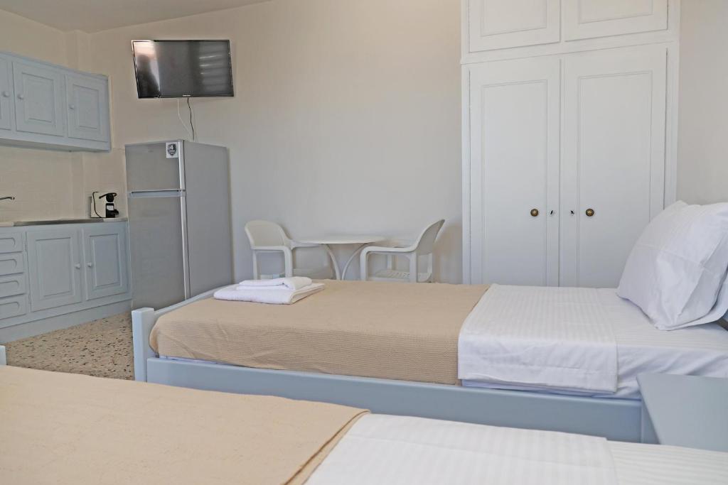 Postel nebo postele na pokoji v ubytování Aira Apartments