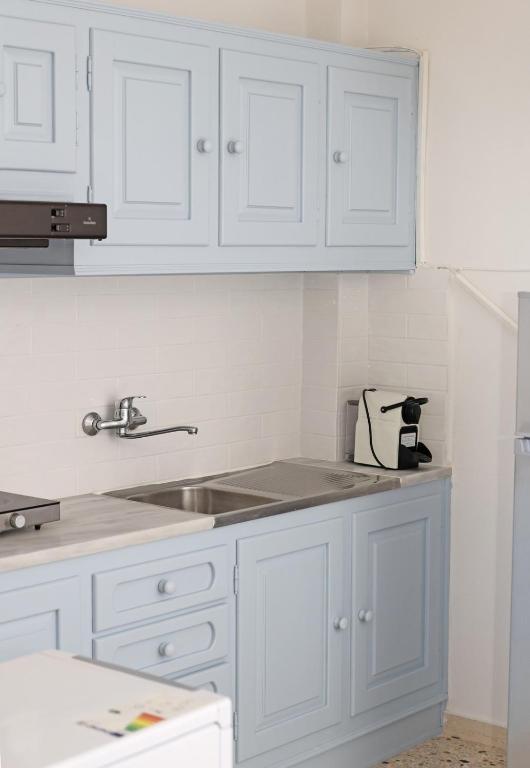 Kuchyň nebo kuchyňský kout v ubytování Aira Apartments