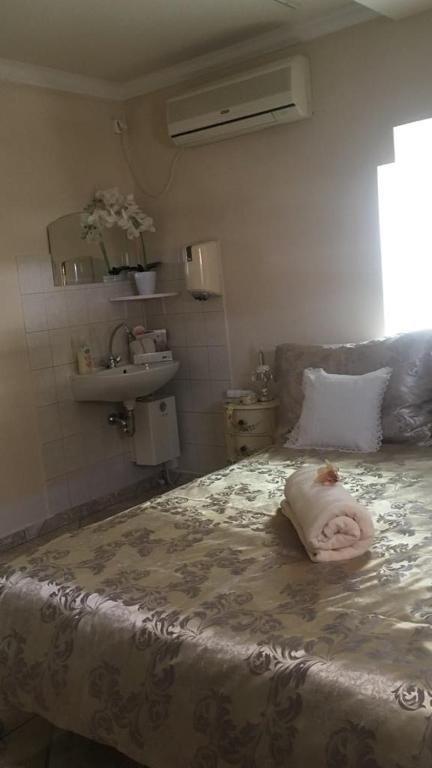 Posteľ alebo postele v izbe v ubytovaní Ádám Apartmanház