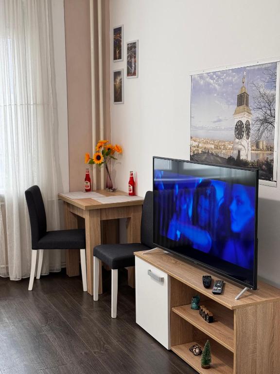 TV a/nebo společenská místnost v ubytování Post apartmani A-1