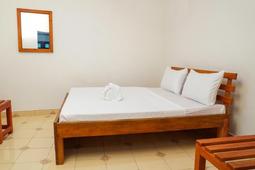 Postel nebo postele na pokoji v ubytování Seven Lotus Villa Kandy