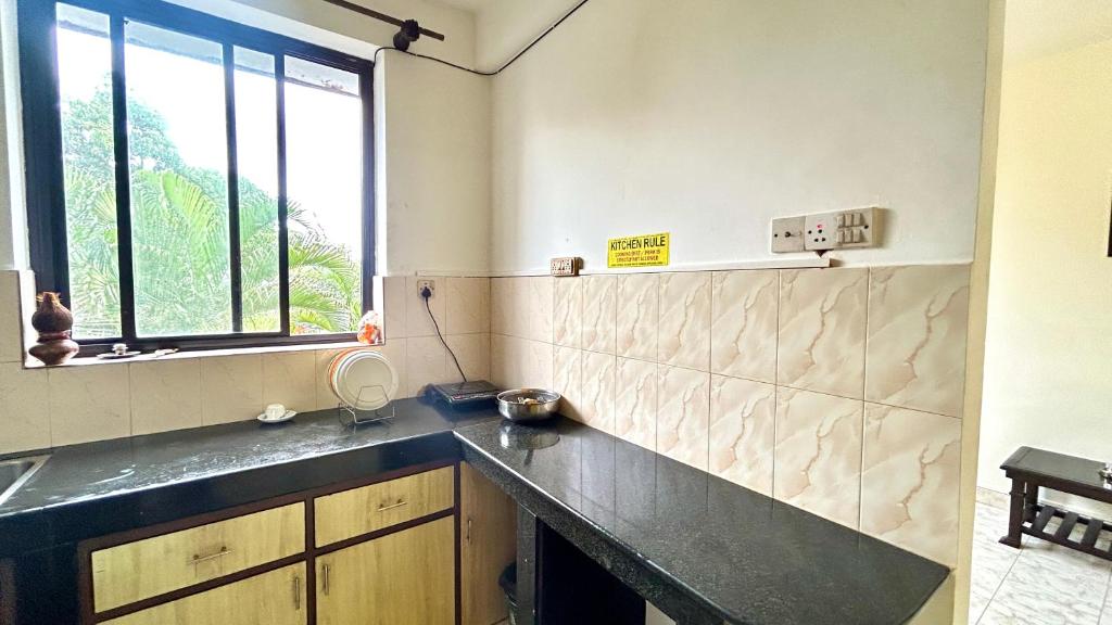 Kuchyň nebo kuchyňský kout v ubytování Muffys Pool Apartment