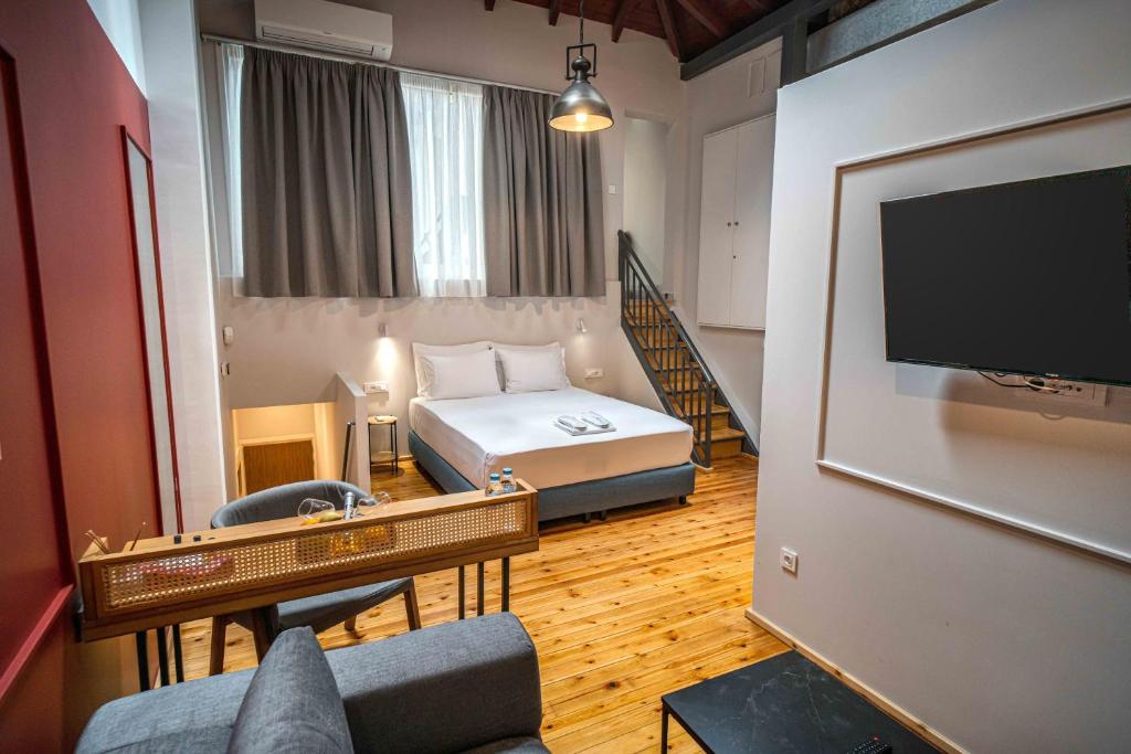 Posteľ alebo postele v izbe v ubytovaní Belle Athenes - Luxury Rooms at Monastiraki Railway Station