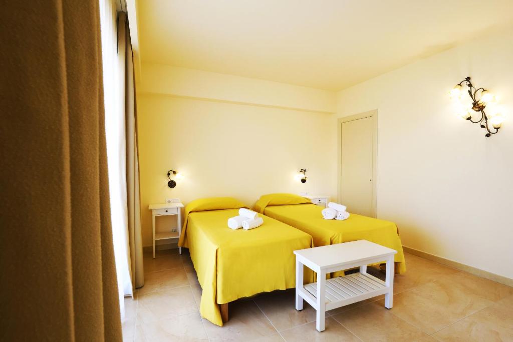 Postel nebo postele na pokoji v ubytování Verdello Home