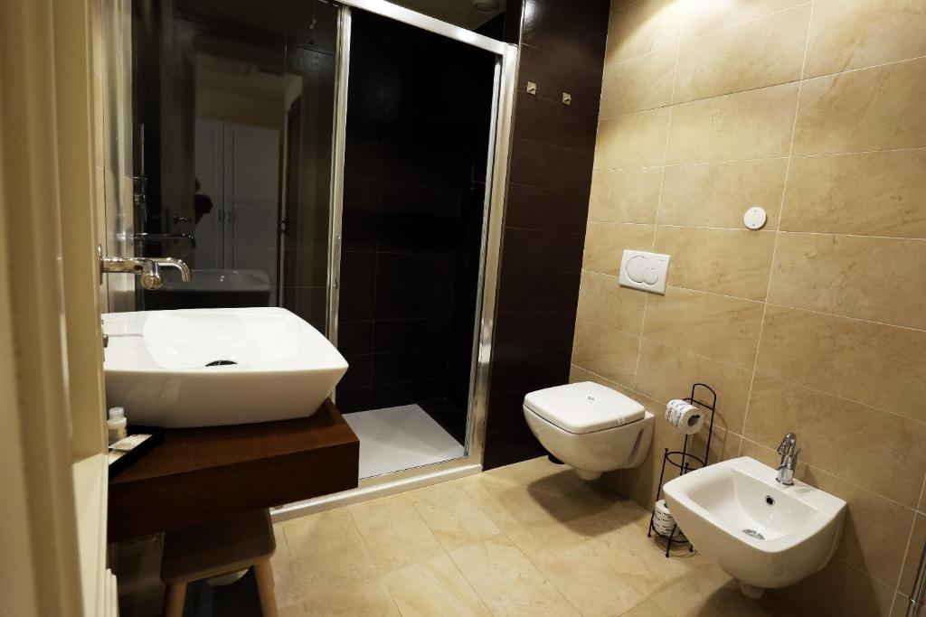 Koupelna v ubytování Verdello Home