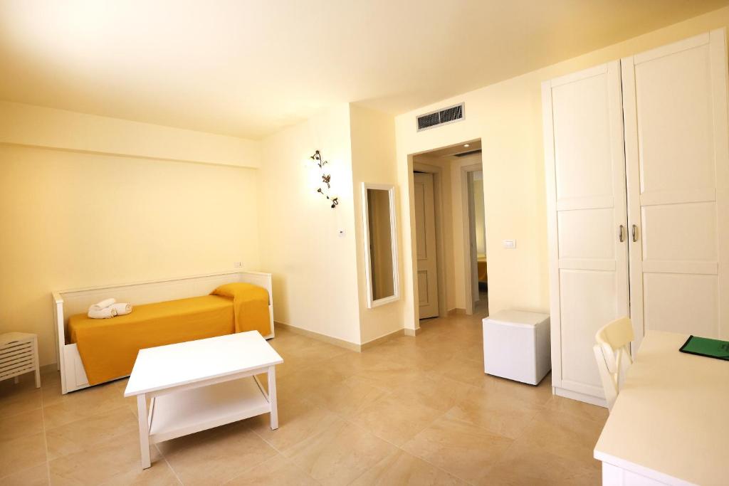Postel nebo postele na pokoji v ubytování Verdello Home