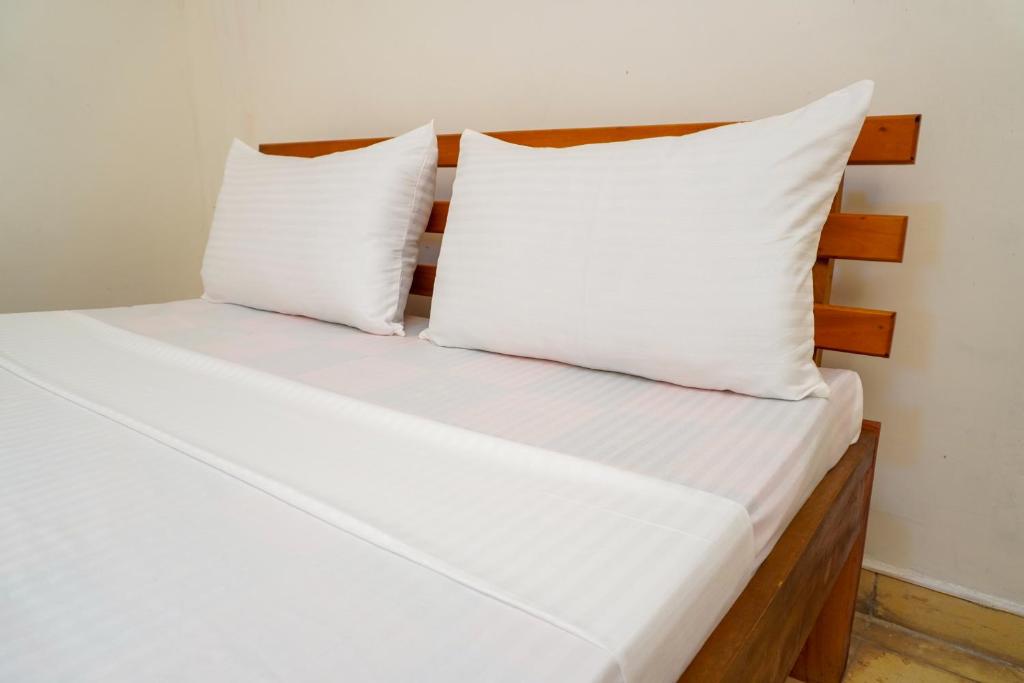 Postel nebo postele na pokoji v ubytování Seven Lotus Villa Kandy