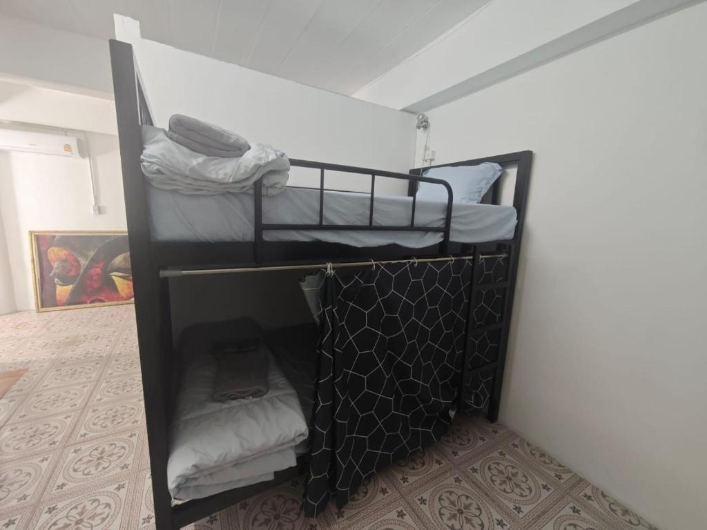 Postel nebo postele na pokoji v ubytování Phuket Inn Patong Hub