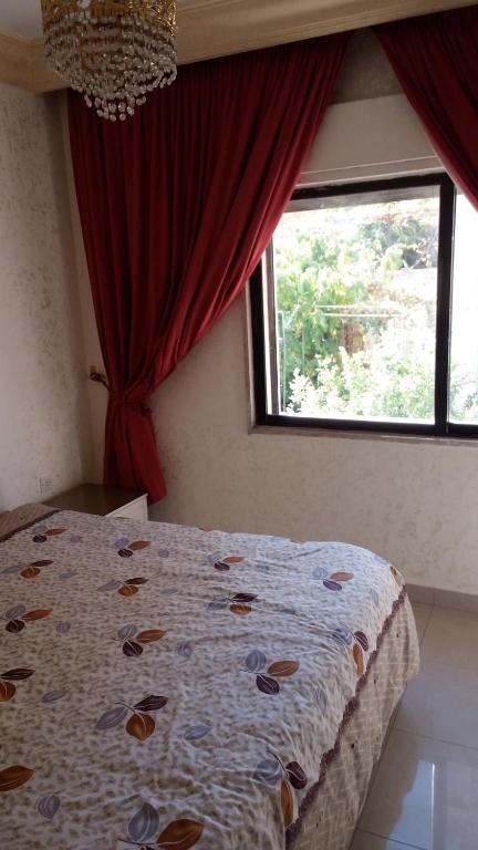 Postel nebo postele na pokoji v ubytování Al Khaleej Hotel Apartments