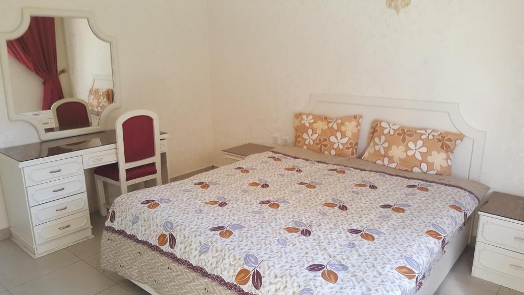 Postel nebo postele na pokoji v ubytování Al Khaleej Hotel Apartments