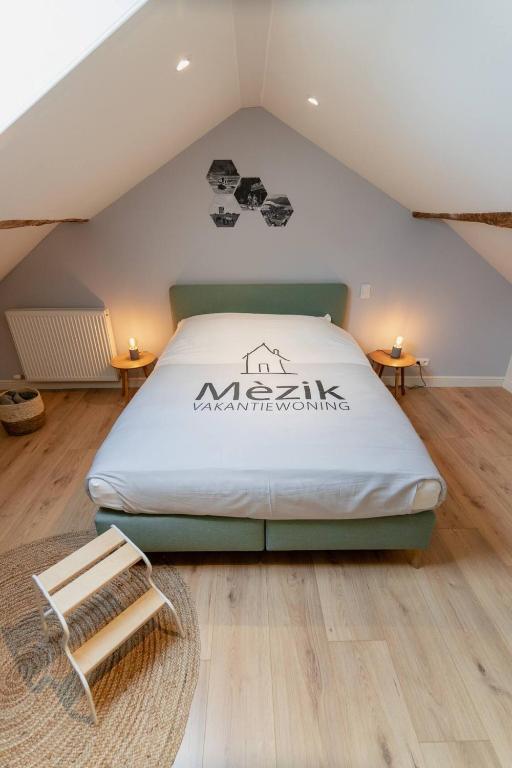 Postel nebo postele na pokoji v ubytování Vakantiewoning Mèzik