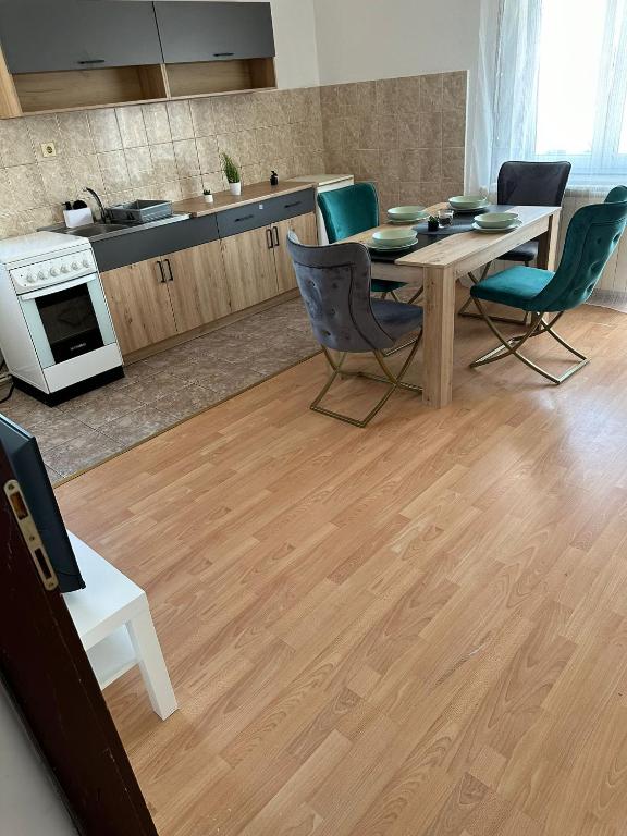 Kuchyň nebo kuchyňský kout v ubytování Apartman Fenix 2