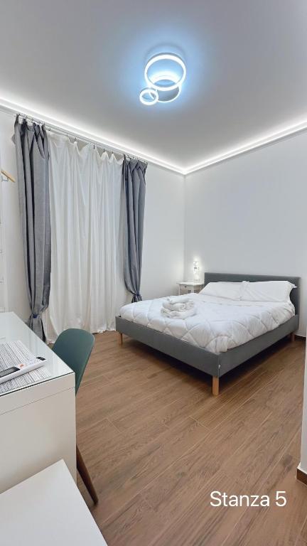 Postel nebo postele na pokoji v ubytování Bea Affittacamere