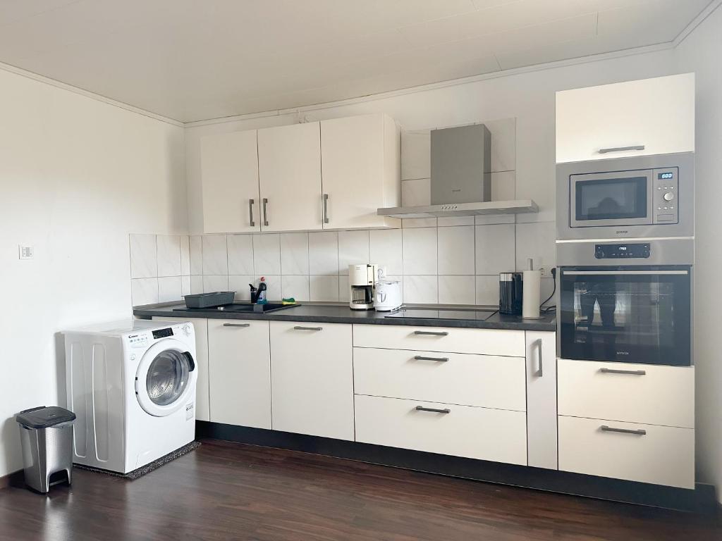 Η κουζίνα ή μικρή κουζίνα στο Vila Bösdorf Apartments