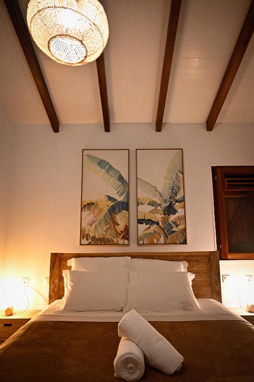 Postel nebo postele na pokoji v ubytování Villa Bibha avec piscine privée