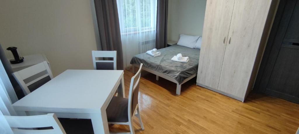 Postel nebo postele na pokoji v ubytování Рута Хелз