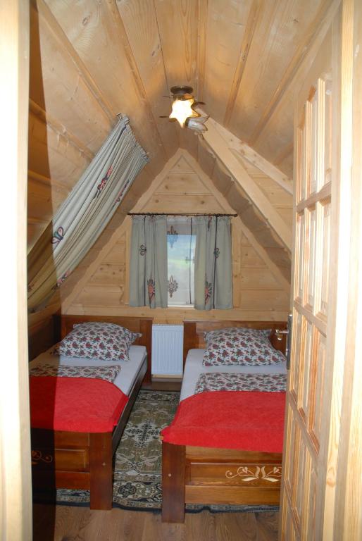 Posteľ alebo postele v izbe v ubytovaní "Chaupa na Walkoszach"Zakopane