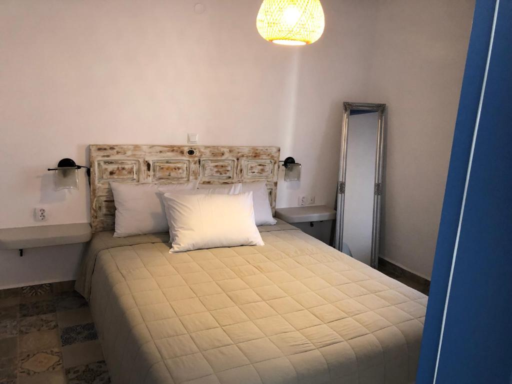 Postel nebo postele na pokoji v ubytování La Polena