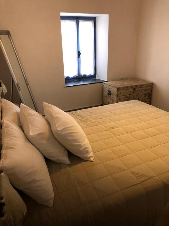 Postel nebo postele na pokoji v ubytování La Polena