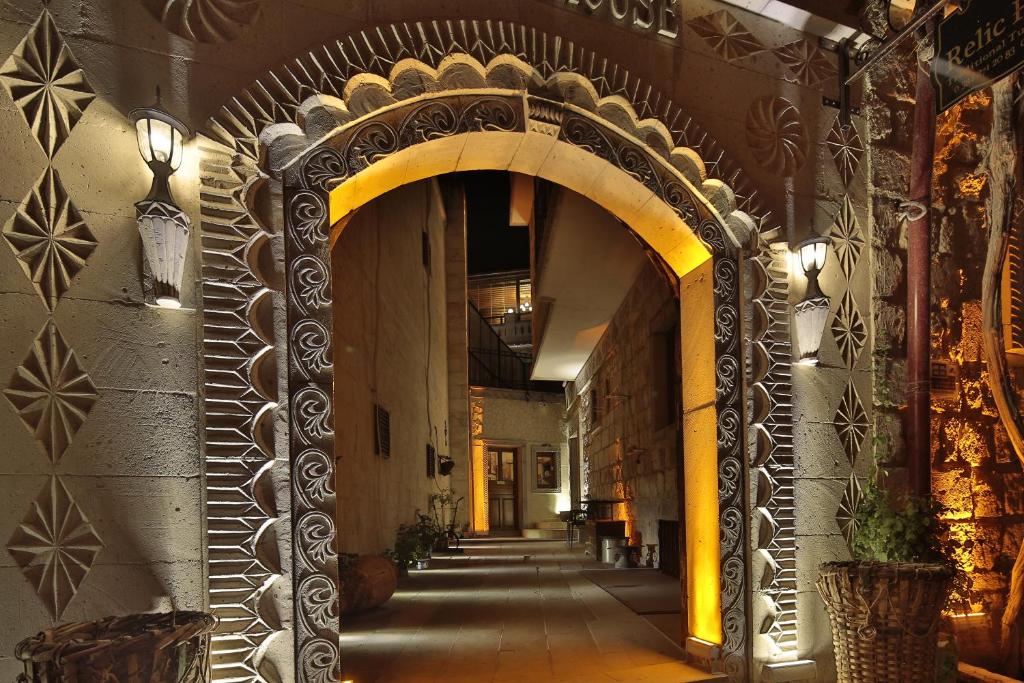 an ornate hallway with an archway in a building at Relic House in Göreme