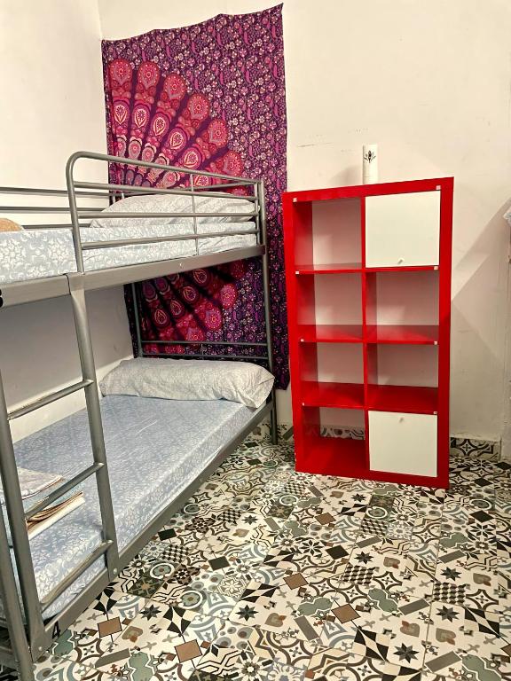 Palanda nebo palandy na pokoji v ubytování Rosa de los Vientos