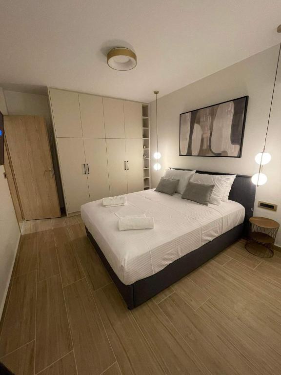 Postel nebo postele na pokoji v ubytování Olive Luxury Suite