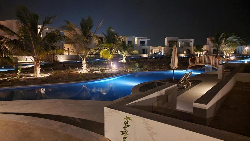Bazén v ubytování Hawana Salalah Poolside Apartment nebo v jeho okolí