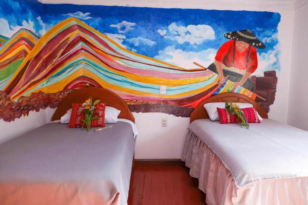 Postel nebo postele na pokoji v ubytování Millas House Cusco