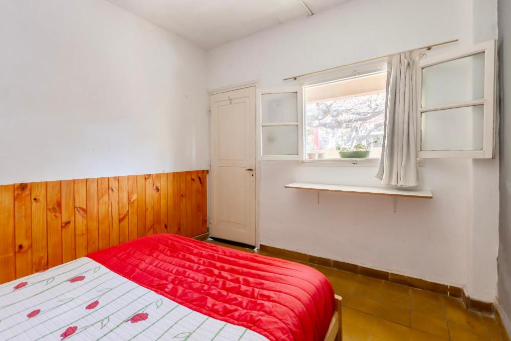 Postel nebo postele na pokoji v ubytování Puerta Azul Hostel
