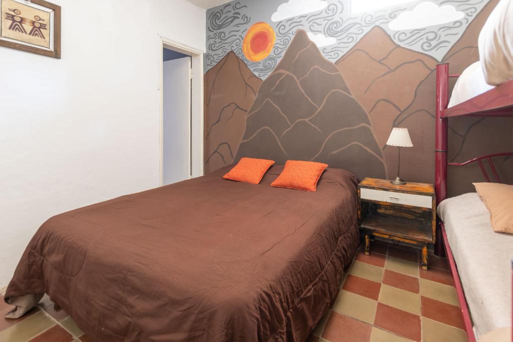 Postel nebo postele na pokoji v ubytování Puerta Azul Hostel
