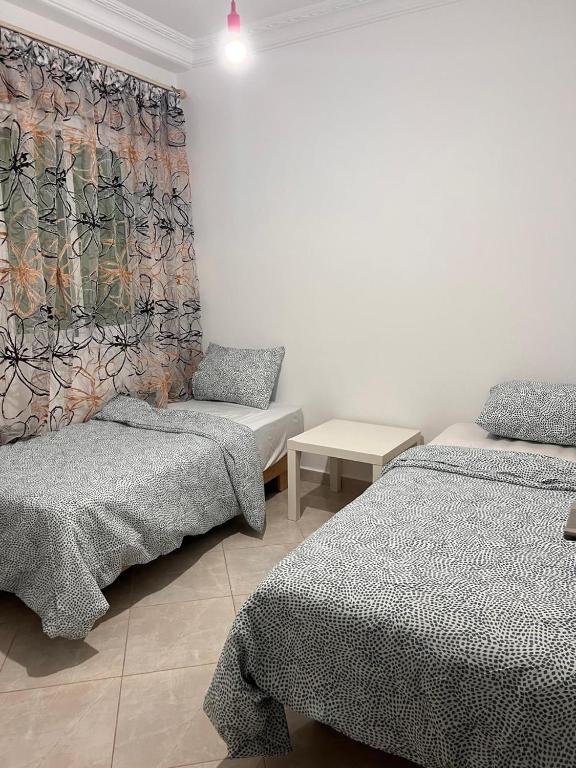 Postel nebo postele na pokoji v ubytování Appartement confortable neuf