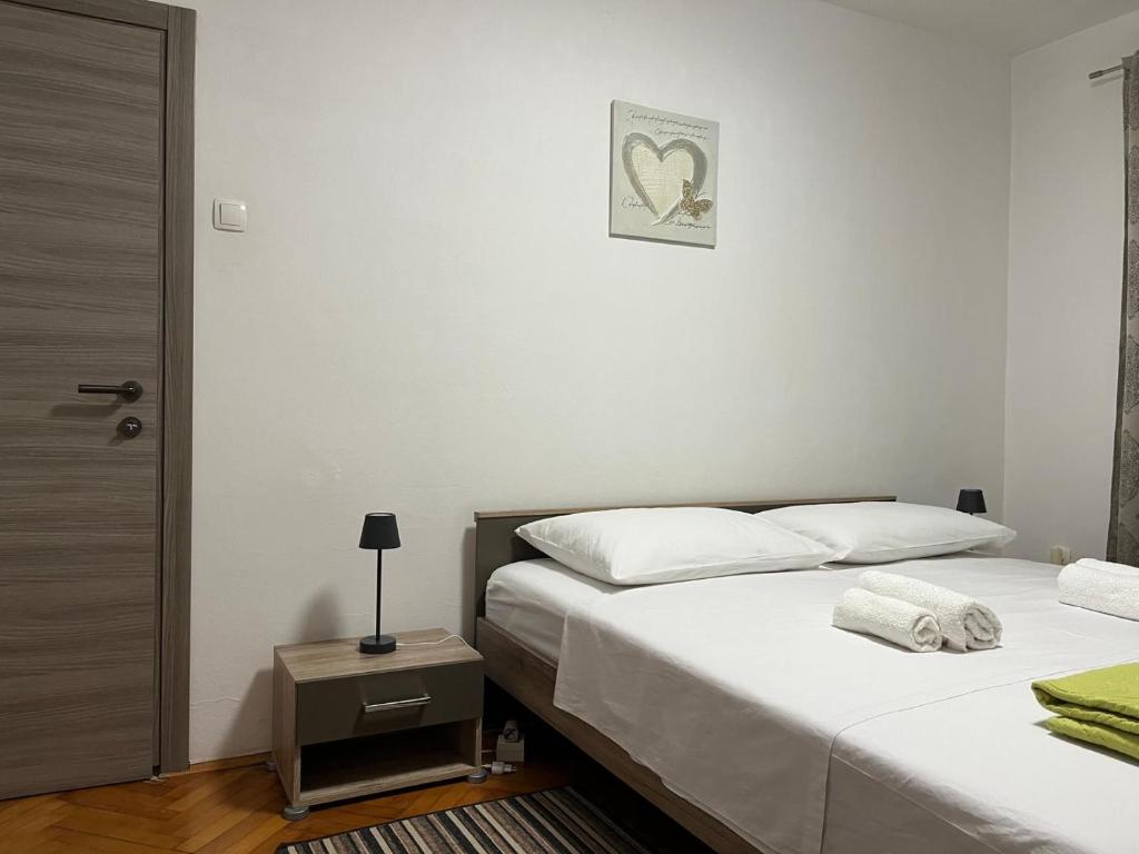 Posteľ alebo postele v izbe v ubytovaní Apartment Iva Zadar