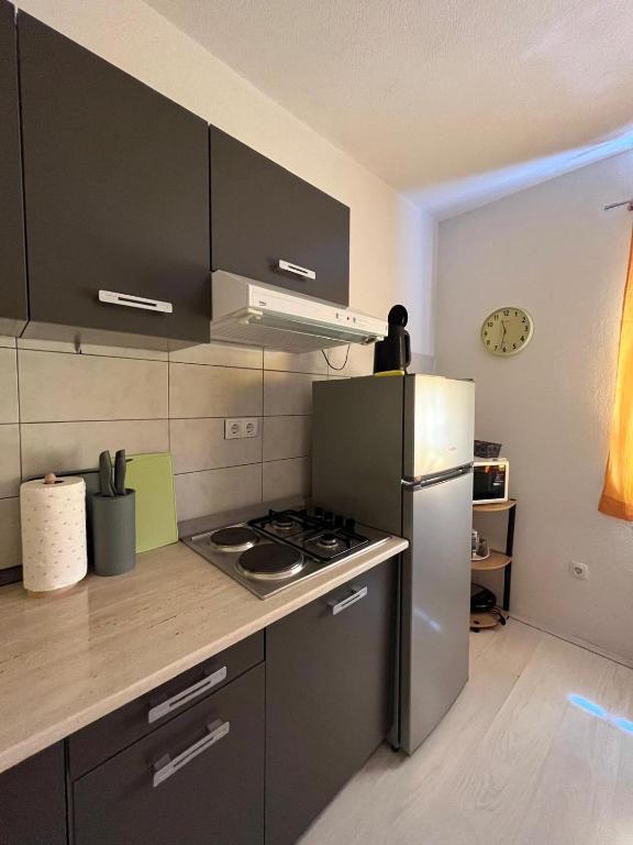 Kuchyňa alebo kuchynka v ubytovaní Apartment Iva Zadar
