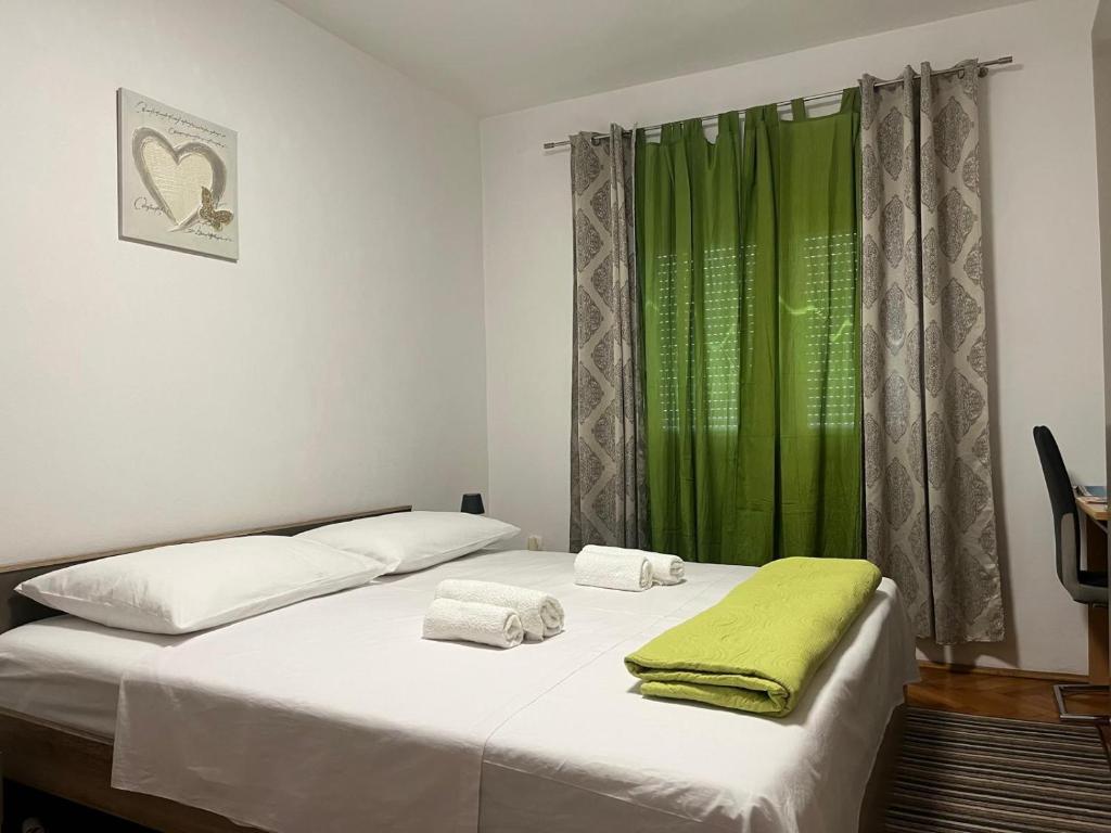 Posteľ alebo postele v izbe v ubytovaní Apartment Iva Zadar