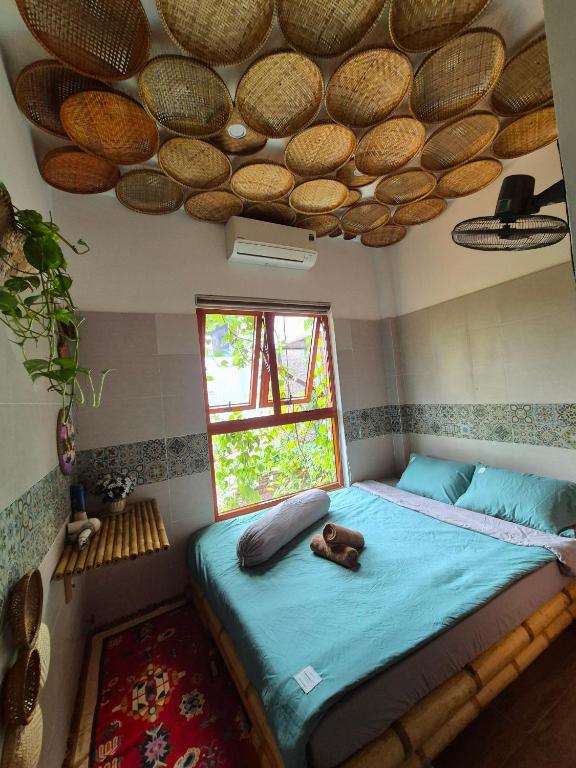 Giường trong phòng chung tại Tâm Family Homestay-Huế