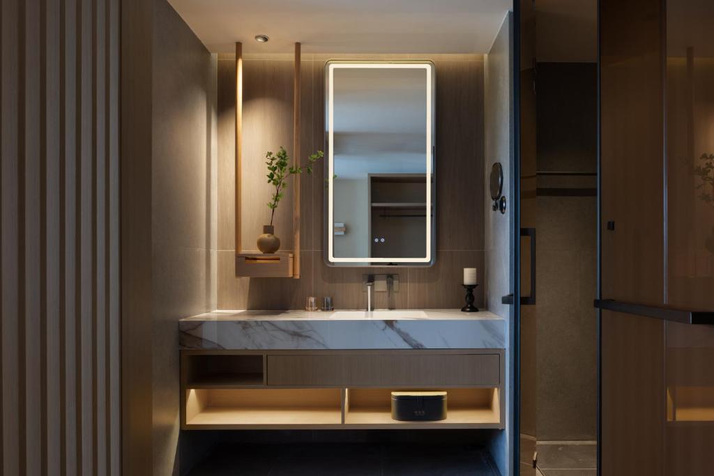 Koupelna v ubytování Yanyu Yunxi Resort Hotel 烟雨云兮酒店