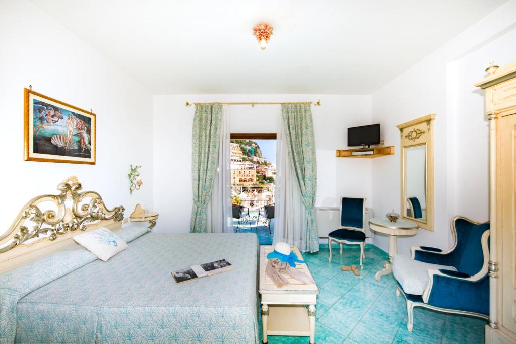 TV a/nebo společenská místnost v ubytování Hotel Royal Prisco