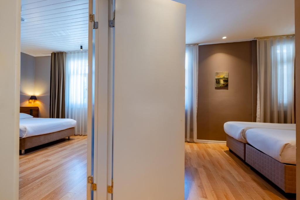 Postel nebo postele na pokoji v ubytování Armagrandi Spina Hotel-Special Category