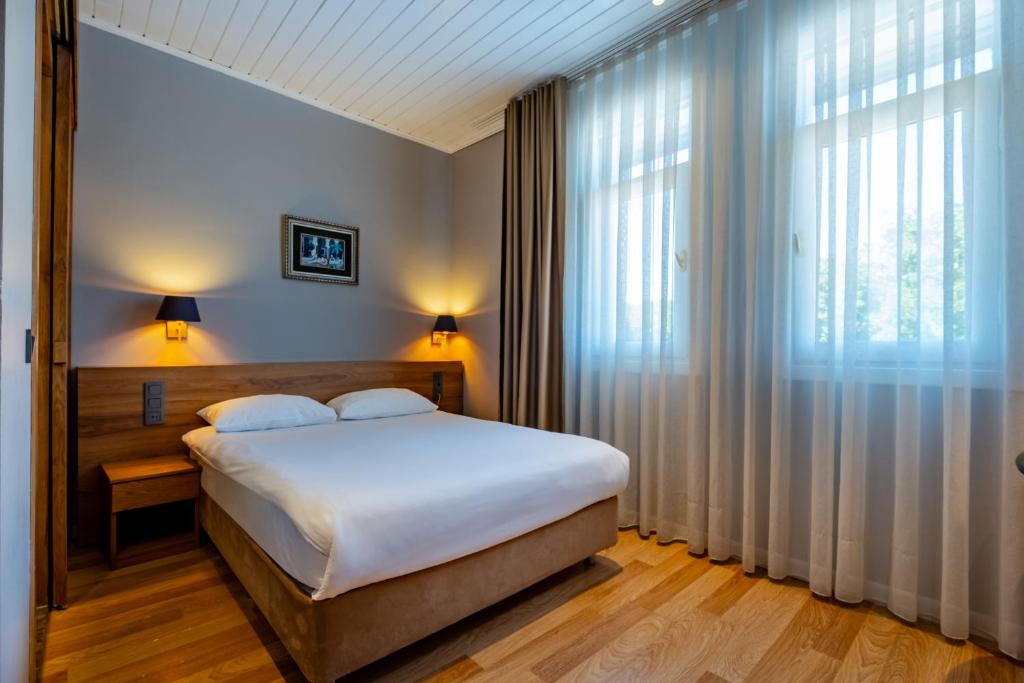 Postel nebo postele na pokoji v ubytování Armagrandi Spina Hotel-Special Category